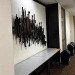 PGA Queensland seeks help to uncover history of mysterious pharmacy artwork icon