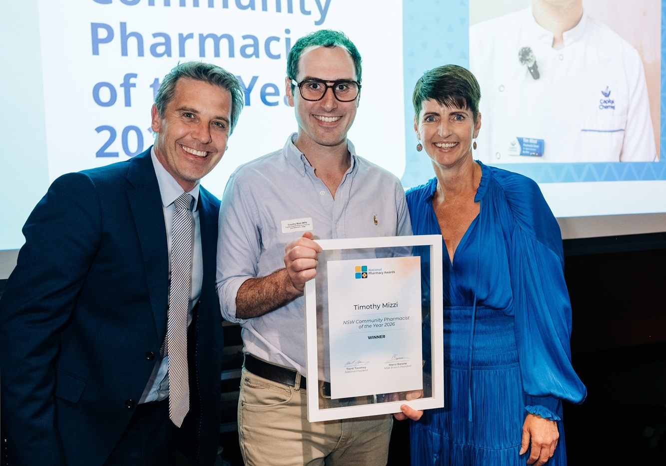 NSW Minister for Health and Regional Affairs Ryan Park with award winner Tim Mizzi and partner