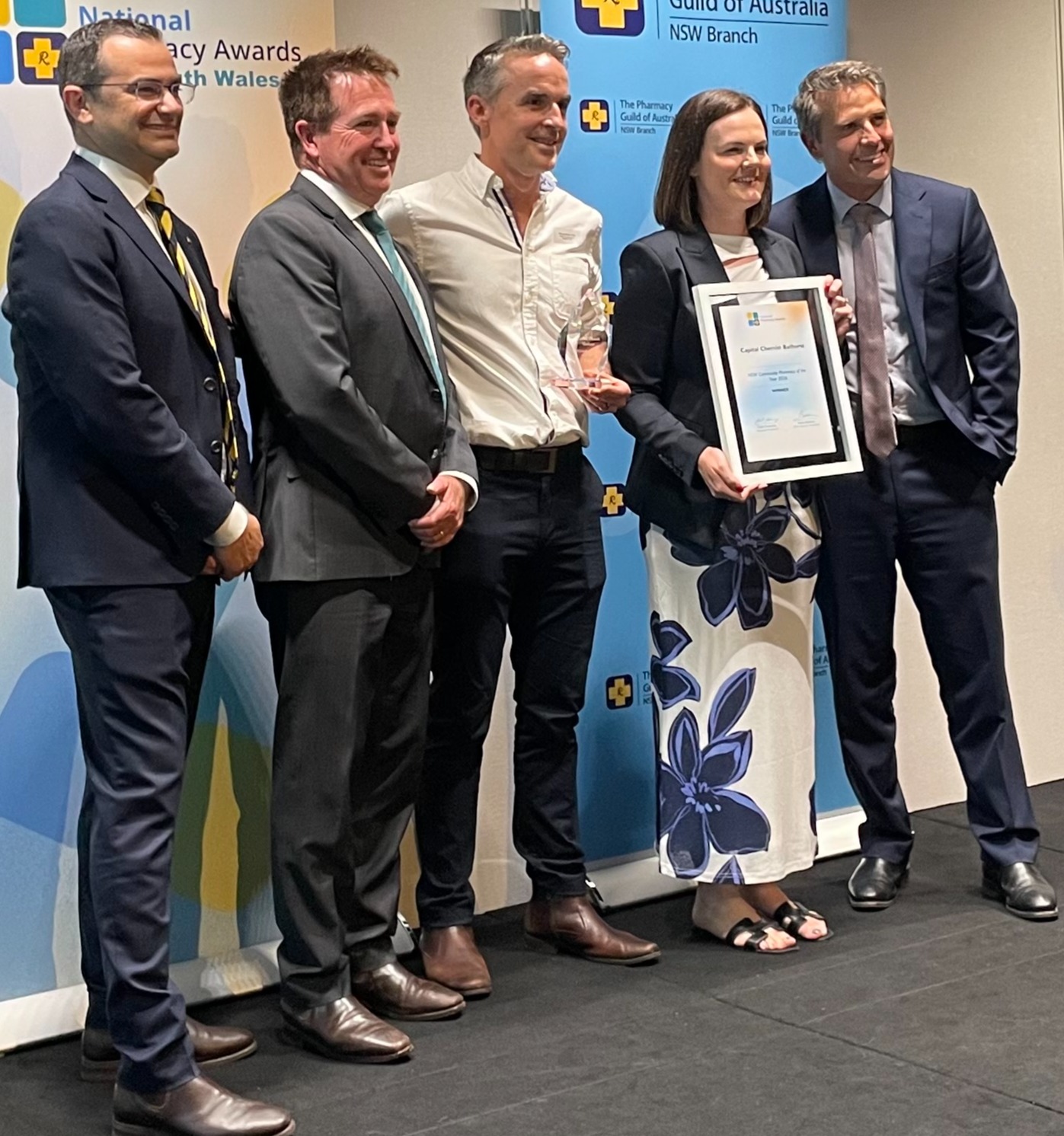 Mario Barone with Minister Park and members of the Captial Chemist Bathurst team Bathurst award winners