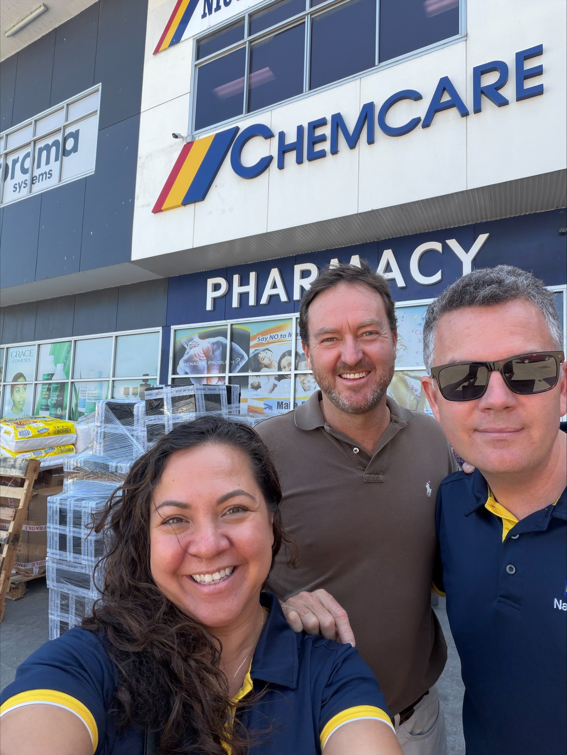 Catherine Bronger with Professor Trent Twomey with Chemcare's Daniel King