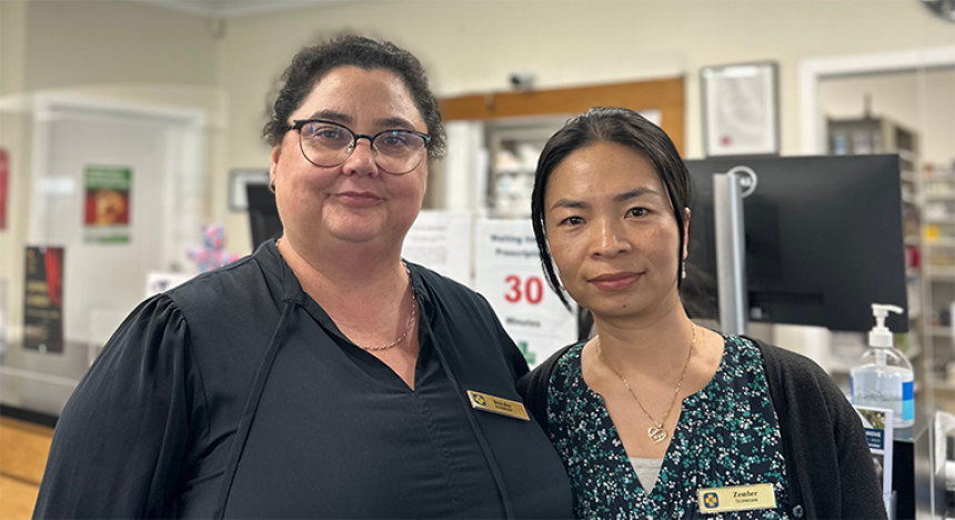 Victory Square Pharmacy owner Dee Maguire and in-house interpreter and member of the local Myanmar refugee community Emily Phow, affectionately known as “Zember”